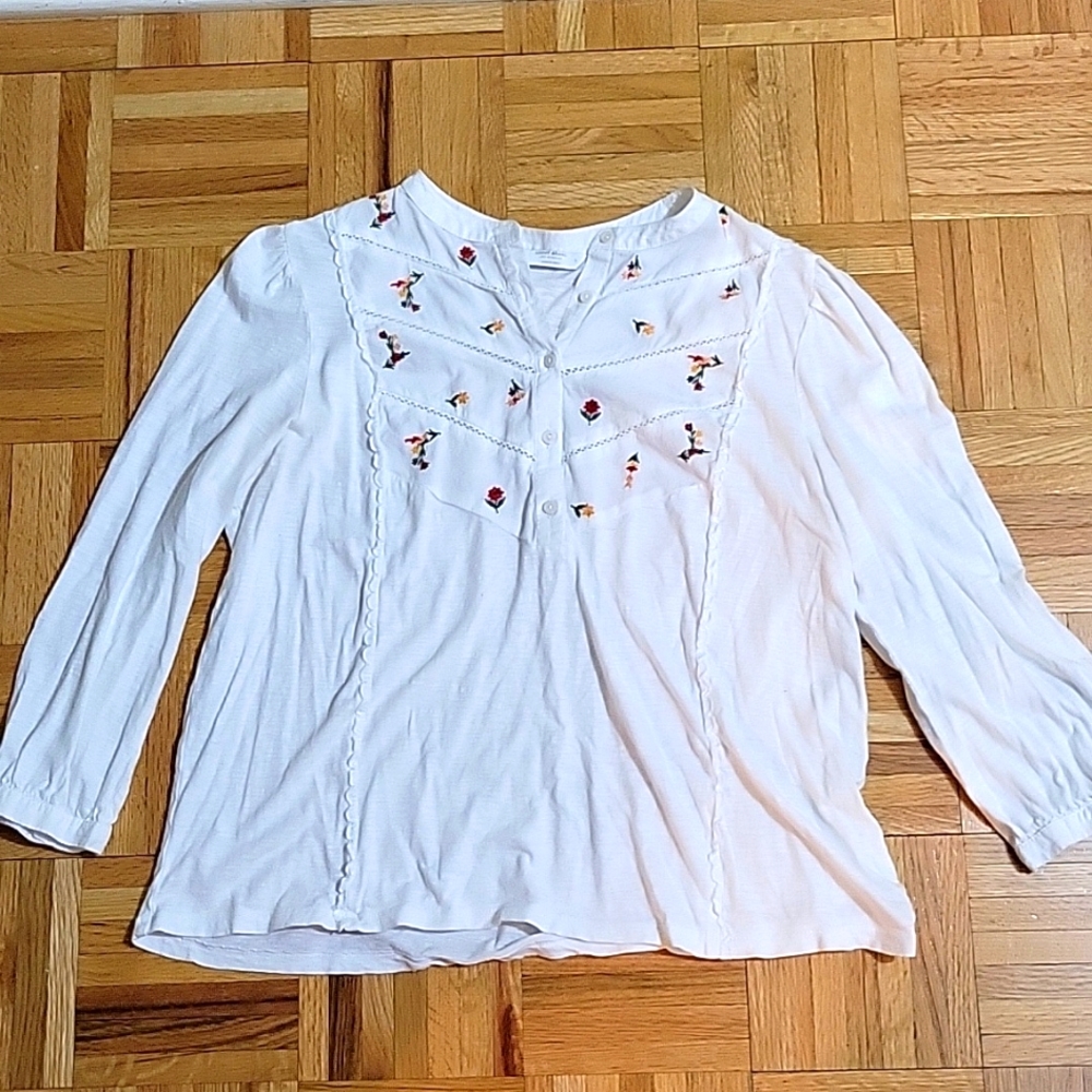 Lucky tee with button fron and floral bib.